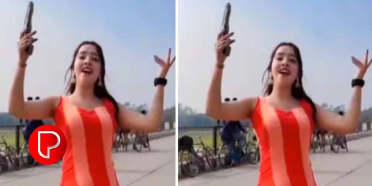 തോക്കുമായി ഹൈവേയിൽ യുവതിയുടെ നൃത്തം; വീഡിയോ വൈറൽ