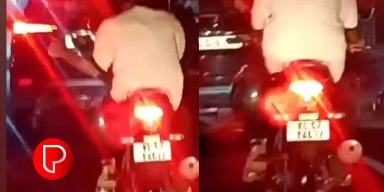 മാവൂർ – ചുള്ളിക്കാപറമ്പ് റോഡില്‍ അപകട റൈഡിങുമായി യുവാവ്; ഓടുന്ന ബൈക്കില്‍ കൈവിട്ട് അഭ്യാസ പ്രകടനം