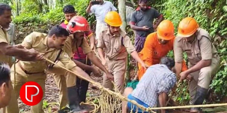 കാരശ്ശേരിയിൽ പശുക്കുട്ടിയെ രക്ഷിക്കാൻ കിണറ്റിലേക്ക് ഇറങ്ങിയപ്പോൾ പാമ്പ്; യുവാവ് കുടുങ്ങിയതോടെ രക്ഷക്കെത്തി ഫയർഫോഴ്‌സ്