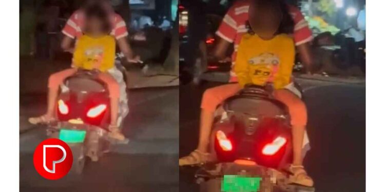 മാവൂർ തെങ്ങിലക്കടവില്‍ ചെറിയ കുട്ടിയെ പിന്നില്‍ പുറം തിരിച്ചിരുത്തി അപകടകരമായ രീതിയില്‍ സ്കൂട്ടര്‍ യാത്ര; മാവൂർ പൊലീസ് കേസെടുത്തു